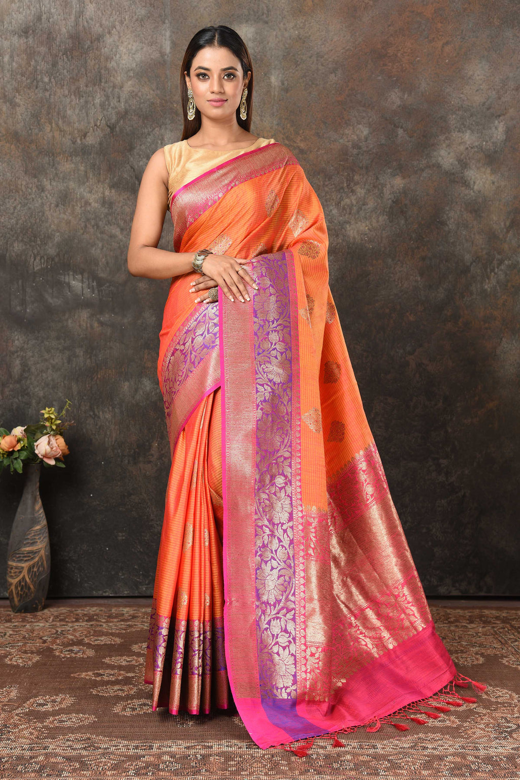 Shop orange Banarasi sari online in USA with purple pink zari border. Look royal at weddings and festive occasions in exquisite Banarasi saris, handwoven sarees, tussar silk sarees, Bollywood sarees, partywear sarees from Pure Elegance Indian saree store in USA.-full view