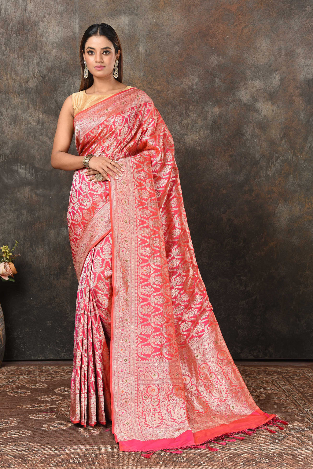 Shop bright pink Banarsi sari online in USA with zari minakari jaal. Look royal at weddings and festive occasions in exquisite Banarasi saris, handwoven sarees, tussar silk sarees, Bollywood sarees, partywear sarees from Pure Elegance Indian saree store in USA.-full view