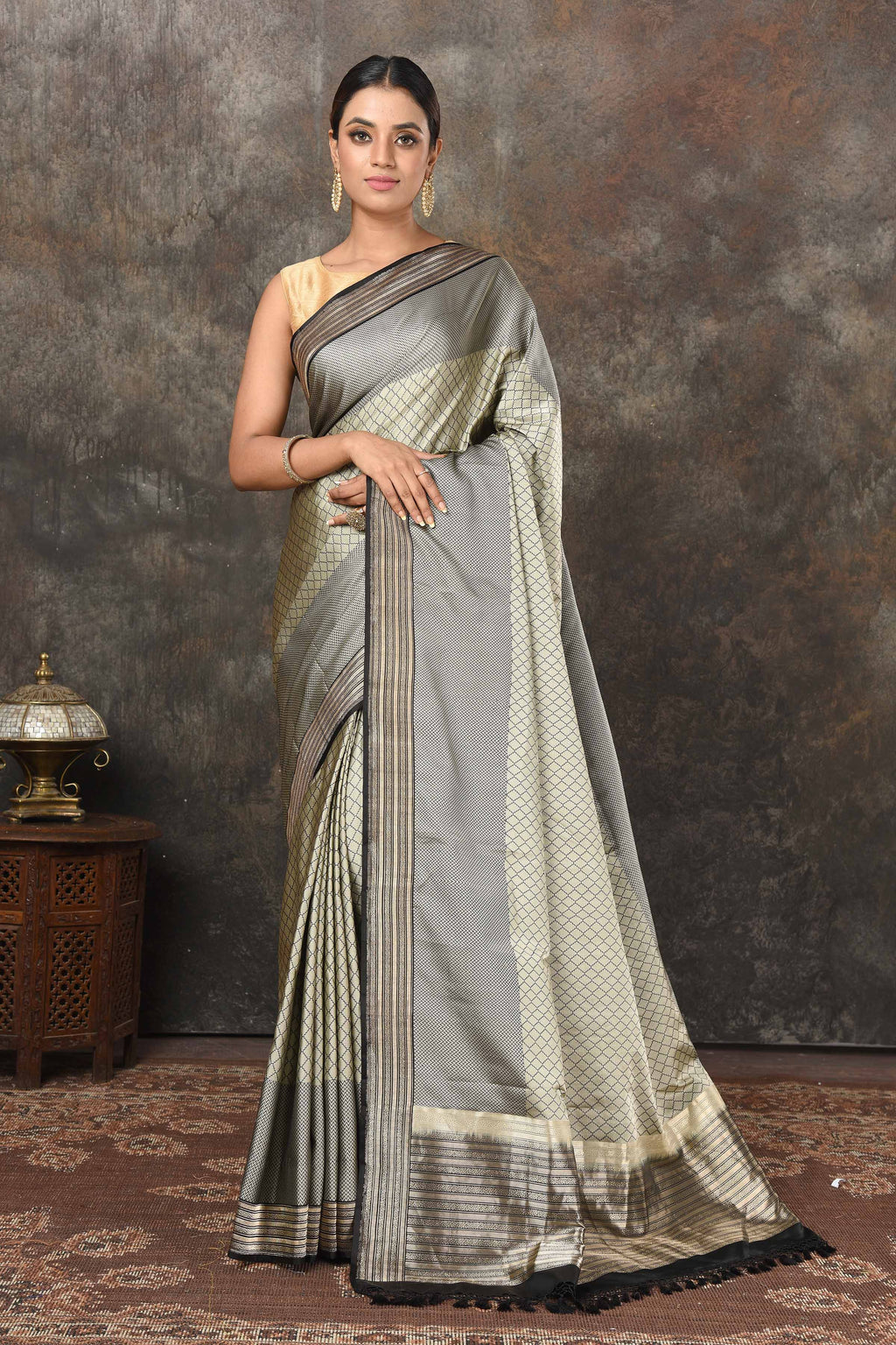 Shop stunning grey Mashru Banarasi  sari online in USA with silver zari border and pallu. Radiate elegance on special occasions in exquisite designer sarees, handwoven sarees, georgette sarees, embroidered sarees, Banarasi saree, pure silk saris, tussar sarees from Pure Elegance Indian saree store in USA.-full view