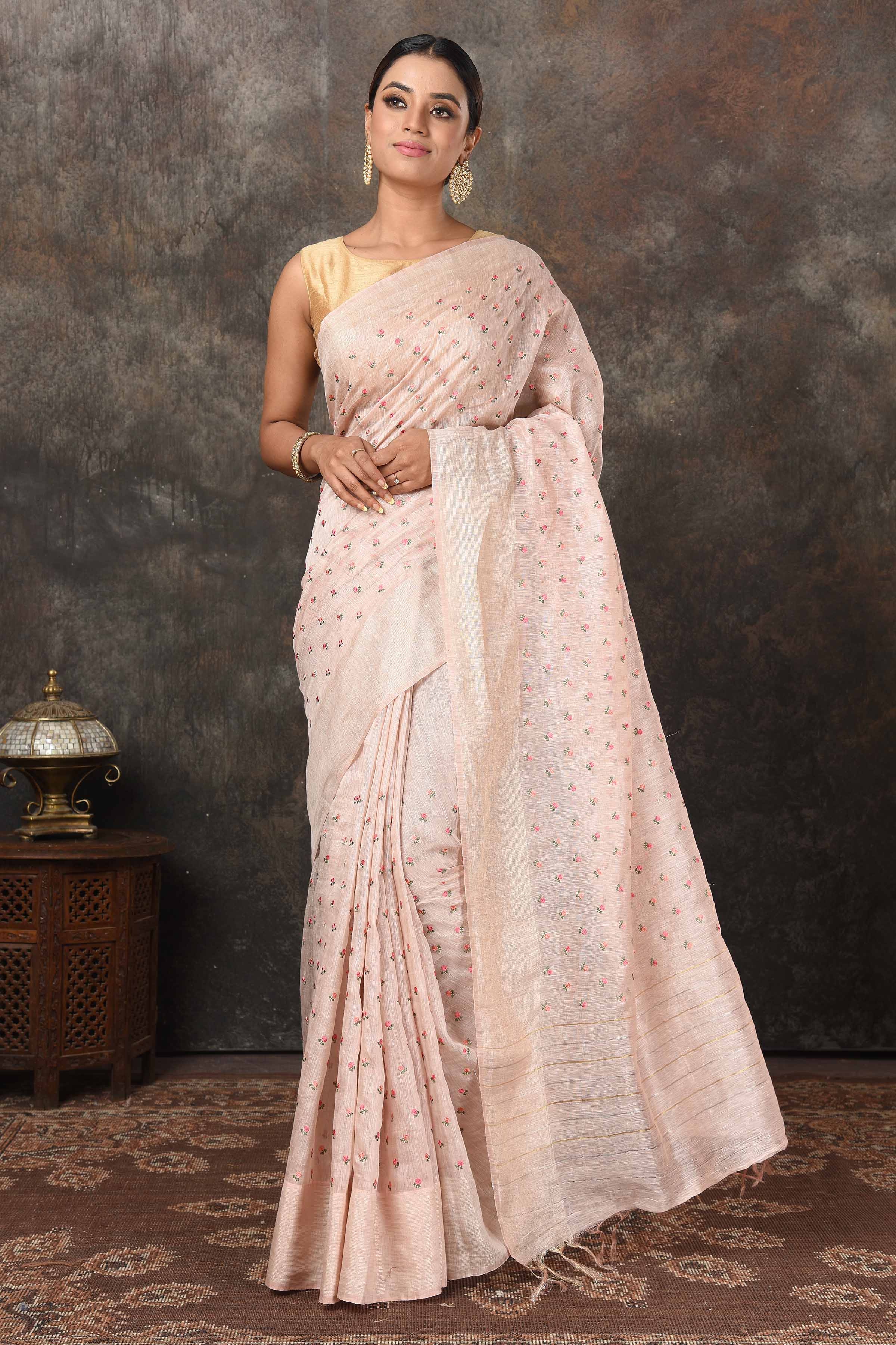 Buy beautiful powder pink linen Banarasi sari online in USA with embroidery. Radiate elegance on special occasions in exquisite designer sarees, handwoven sarees, georgette sarees, embroidered sarees, Banarasi saree, pure silk saris, tussar sarees from Pure Elegance Indian saree store in USA.-full view