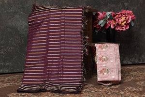 Shop beautiful purple striped tissue Banarasi sari online in USA. Radiate elegance on special occasions in exquisite designer sarees, handwoven sarees, georgette sarees, embroidered sarees, Banarasi saree, pure silk saris, tussar sarees from Pure Elegance Indian saree store in USA.-blouse