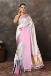 Shop beautiful lilac Banarasi Mashru silk saree online in USA with striped border. Radiate elegance on special occasions in exquisite designer sarees, handwoven sarees, georgette sarees, embroidered sarees, Banarasi saree, pure silk saris, tussar sarees from Pure Elegance Indian saree store in USA.-full view