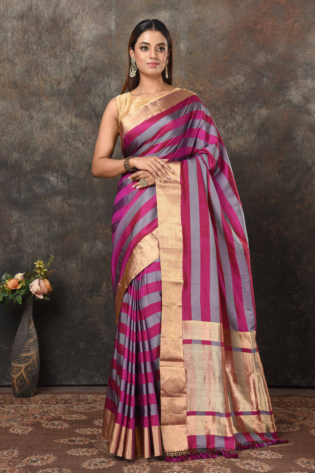 Buy beautiful magent grey stripes Banarasi Mashru silk sari online in USA with golden border. Radiate elegance on special occasions in exquisite designer sarees, handwoven sarees, georgette sarees, embroidered sarees, Banarasi saree, pure silk saris, tussar sarees from Pure Elegance Indian saree store in USA.-full view
