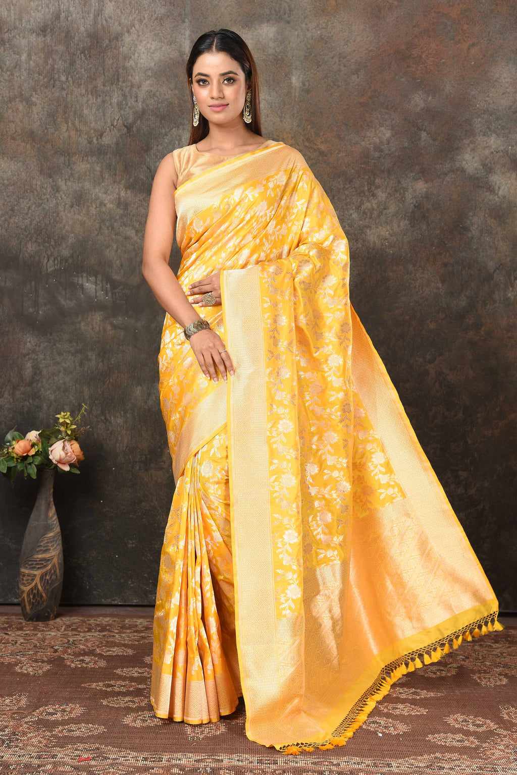 Buy stunning yellow Banarasi Mashru silk sari online in USA with golden zari jaal. Radiate elegance on special occasions in exquisite designer sarees, handwoven sarees, georgette sarees, embroidered sarees, Banarasi saree, pure silk saris, tussar sarees from Pure Elegance Indian saree store in USA.-full view