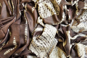 Buy stunning brown shibori print tussar silk saree online in USA. Look elegant on special occasions in beautiful printed sarees, silk sarees, tussar sarees, handloom sarees, Kanchipuram sarees from Pure Elegance Indian saree store in USA.-closeup