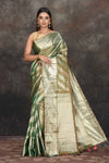 Buy beautiful mehendi green and silver tissue Kanjeevaram saree online in USA. Be the center of attraction on special occasions in ethnic sarees, designer sarees, embroidered sarees, handwoven sarees, pure silk sarees from Pure Elegance Indian saree store in USA.-full view