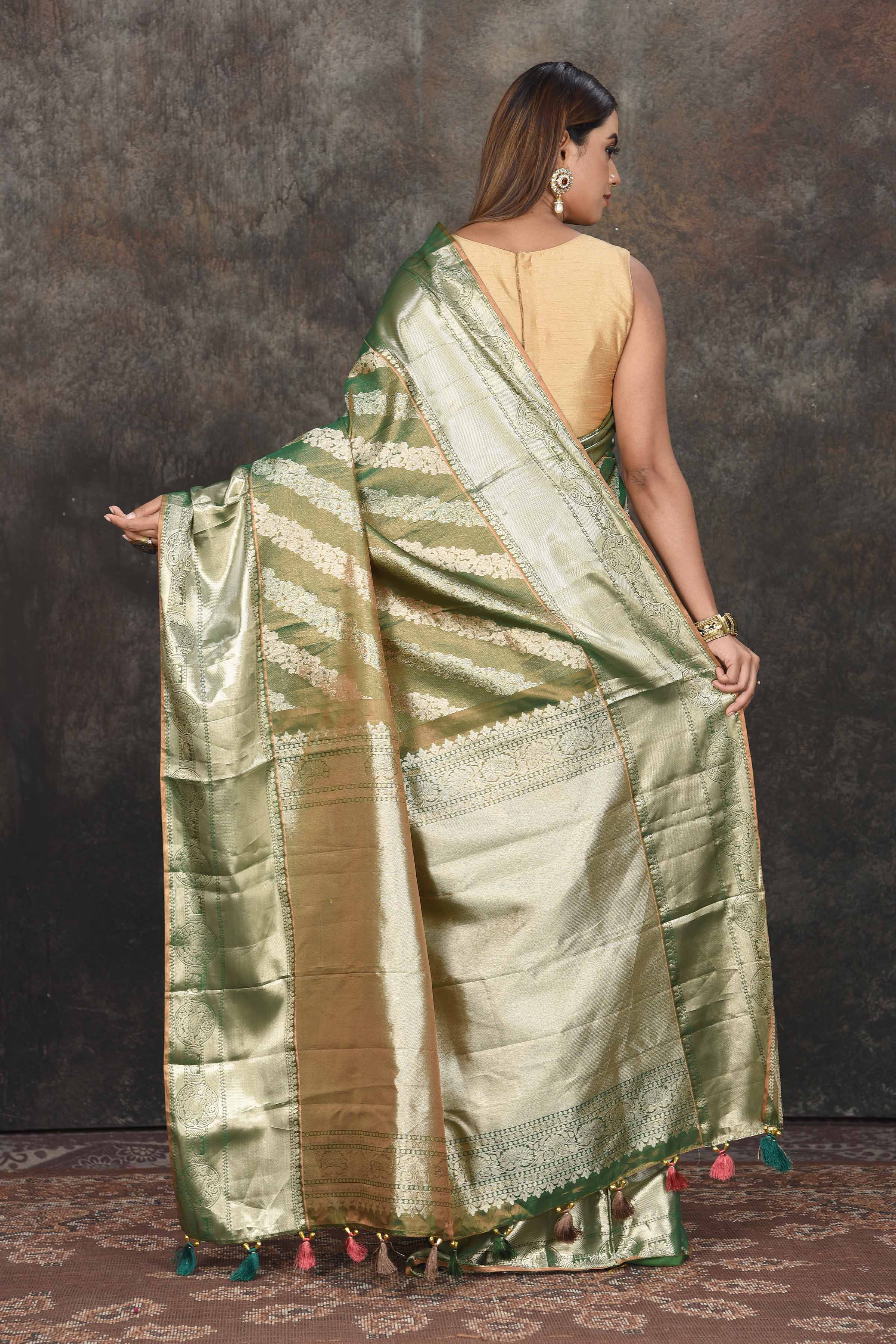 Buy beautiful mehendi green and silver tissue Kanjeevaram saree online in USA. Be the center of attraction on special occasions in ethnic sarees, designer sarees, embroidered sarees, handwoven sarees, pure silk sarees from Pure Elegance Indian saree store in USA.-back