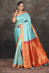 Buy light blue Kanjeevaram brocade sari online in USA with red zari border. Be the center of attraction on special occasions in ethnic sarees, designer sarees, embroidered sarees, handwoven sarees, pure silk sarees from Pure Elegance Indian saree store in USA.-full view