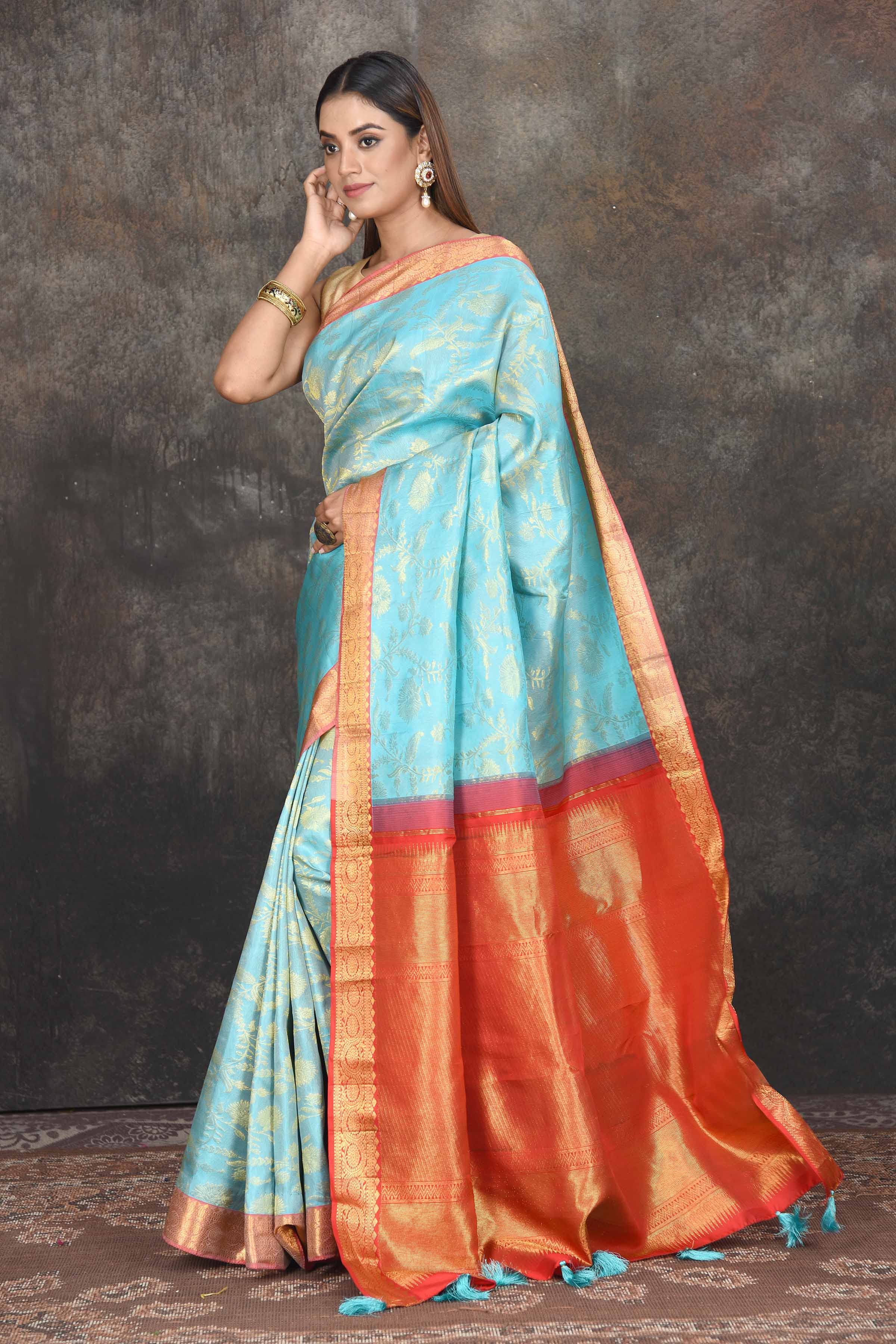 Buy light blue Kanjeevaram brocade sari online in USA with red zari border. Be the center of attraction on special occasions in ethnic sarees, designer sarees, embroidered sarees, handwoven sarees, pure silk sarees from Pure Elegance Indian saree store in USA.-pallu
