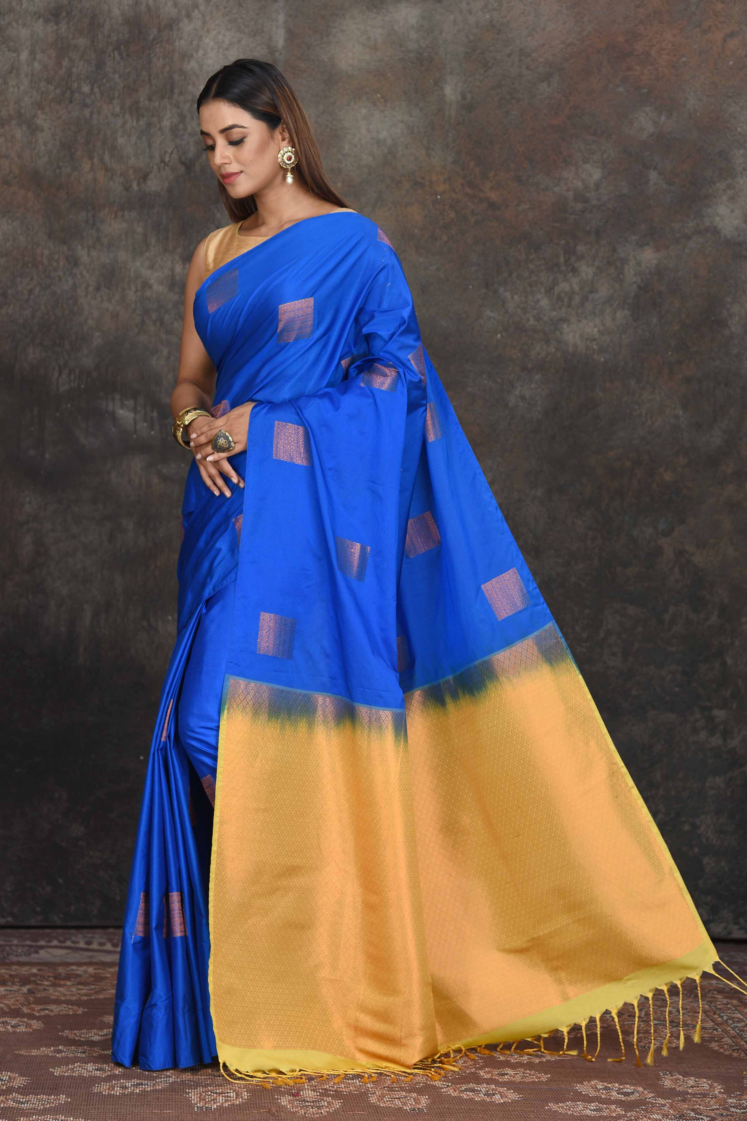 Shop blue Kanjivaram soft silk sari online in USA with golden zari pallu. Be the center of attraction on special occasions in ethnic sarees, designer sarees, embroidered sarees, handwoven sarees, pure silk sarees from Pure Elegance Indian saree store in USA.-full view