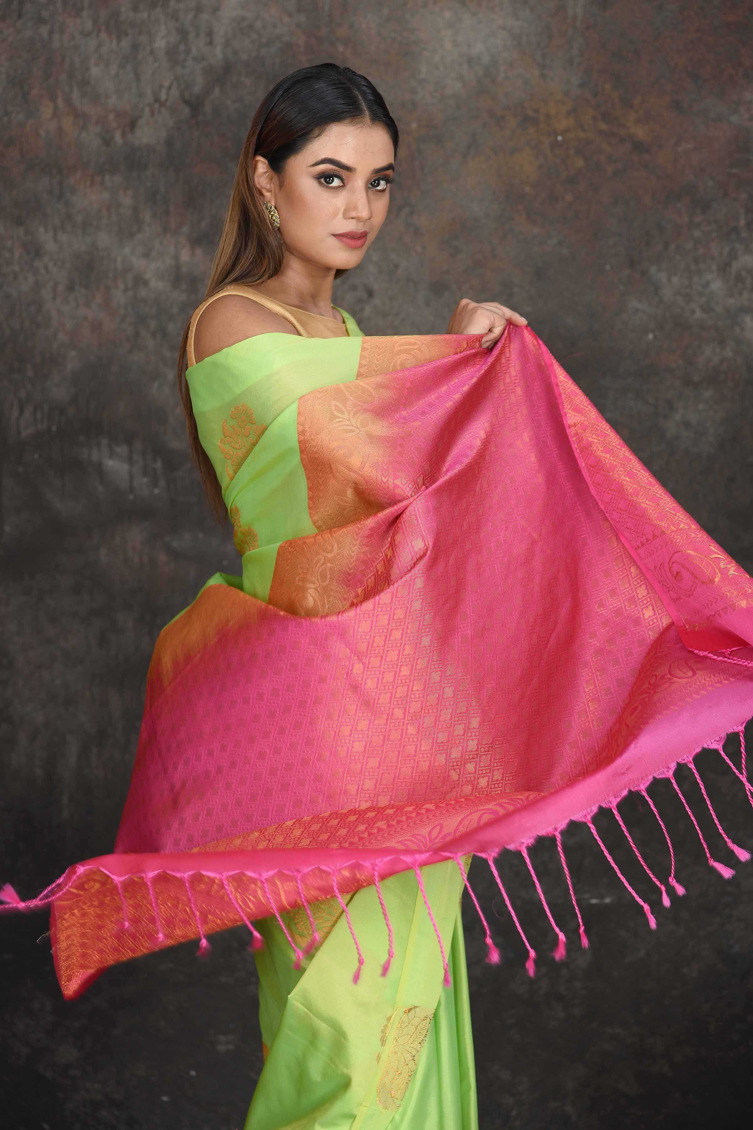 Buy beautiful pastel green Kanjivaram soft silk sari online in USA with pink zari pallu. Be the center of attraction on special occasions in ethnic sarees, designer sarees, embroidered sarees, handwoven sarees, pure silk sarees from Pure Elegance Indian saree store in USA.-closeup