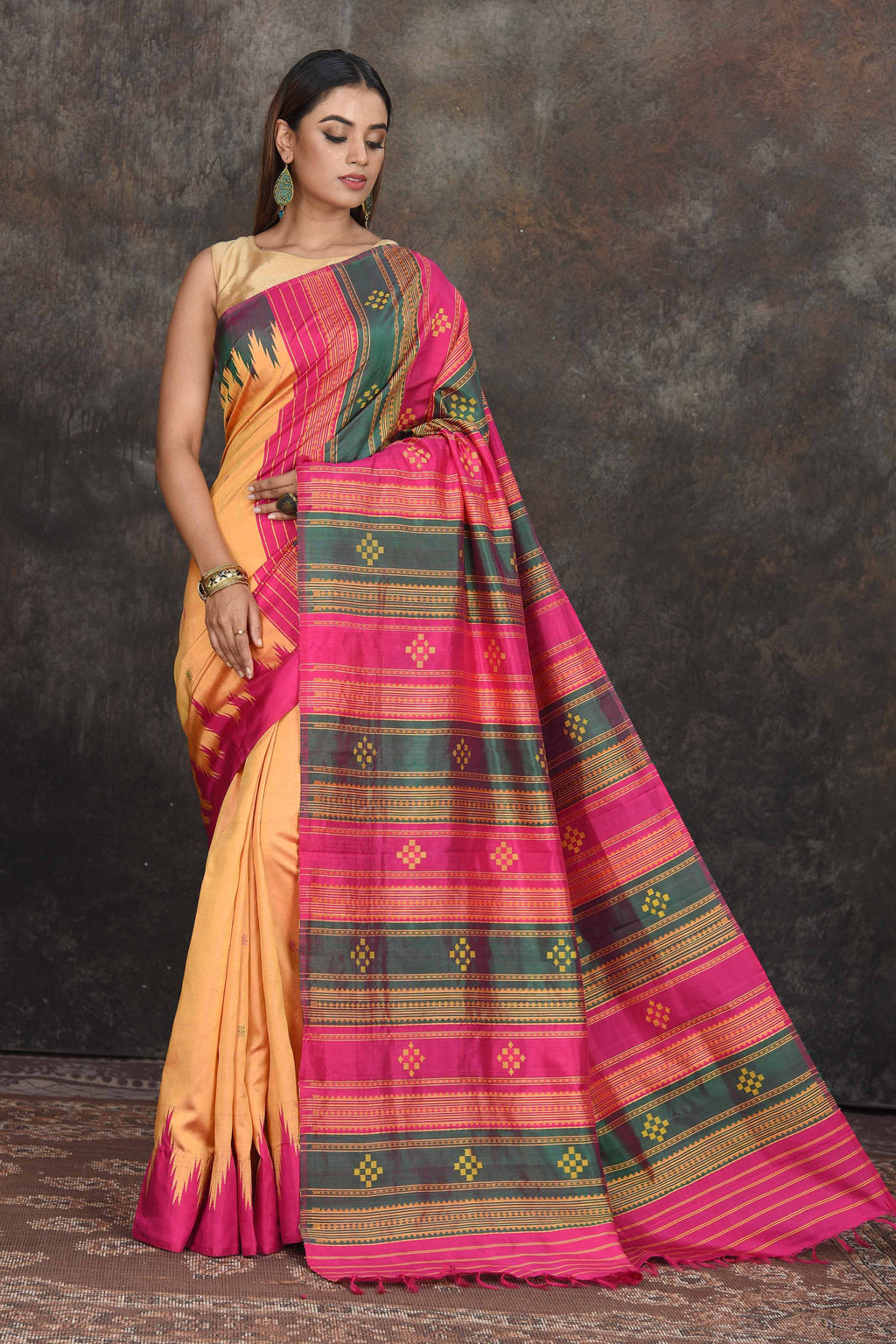 Shop stunning yellow Ponduru silk saree online in USA with multicolor pallu. Go for a rich traditional look on weddings and festive occasions in pure silk sarees, Kanchipuram silk sarees, handloom sarees, Banarasi sarees from Pure Elegance Indian fashion store in USA.-full view