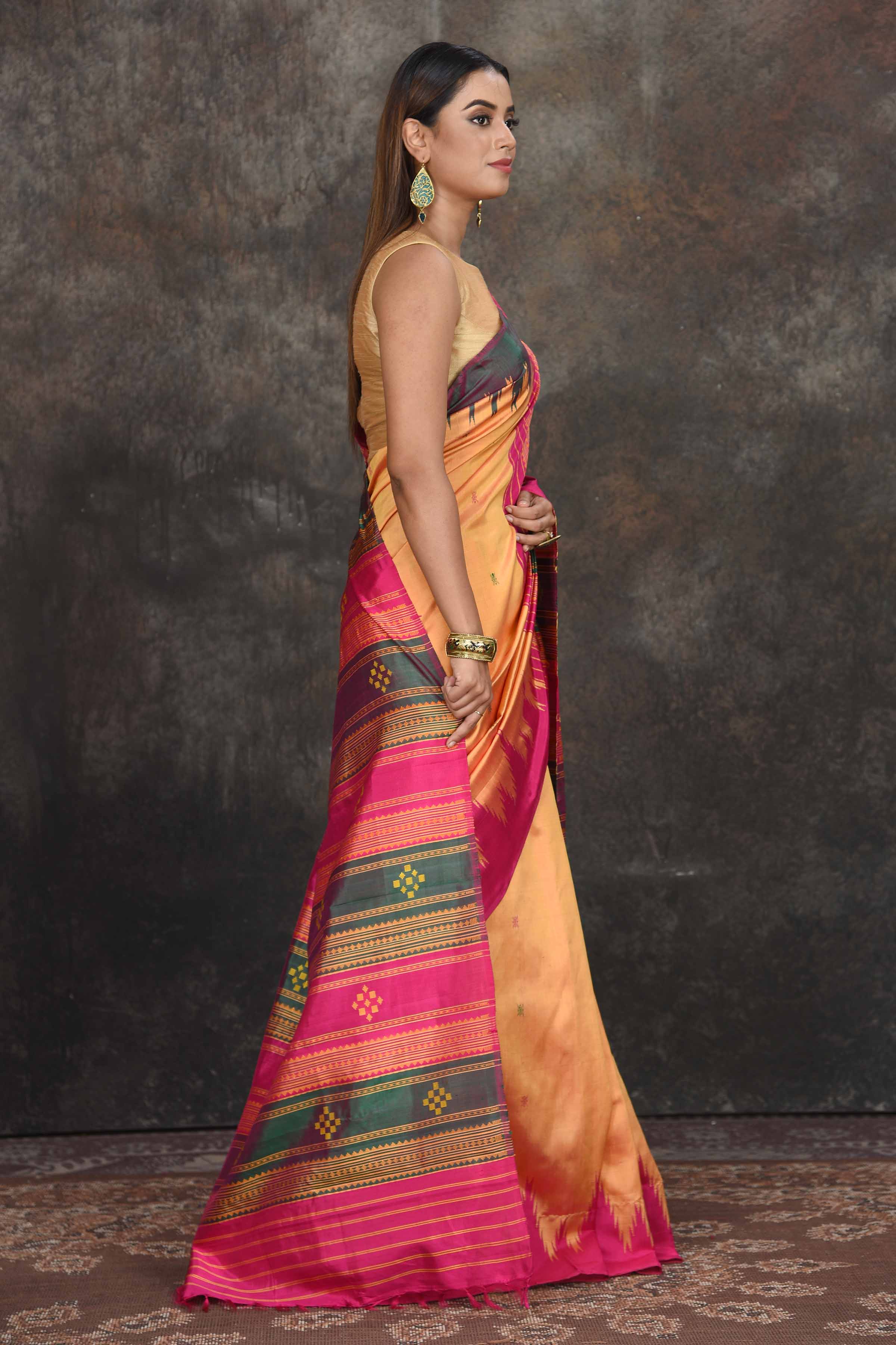 Shop stunning yellow Ponduru silk saree online in USA with multicolor pallu. Go for a rich traditional look on weddings and festive occasions in pure silk sarees, Kanchipuram silk sarees, handloom sarees, Banarasi sarees from Pure Elegance Indian fashion store in USA.-side