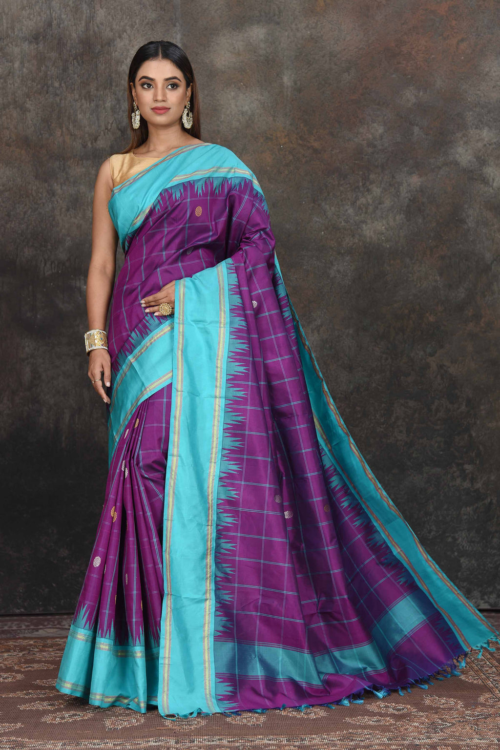 Shop beautiful purple check Kanjeevaram sari online in USA with blue border. Go for a rich traditional look on weddings and festive occasions in pure silk sarees, Kanchipuram silk sarees, handloom sarees, Banarasi sarees from Pure Elegance Indian fashion store in USA.-full view