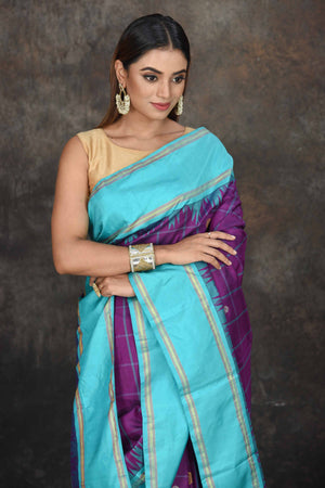 Shop beautiful purple check Kanjeevaram sari online in USA with blue border. Go for a rich traditional look on weddings and festive occasions in pure silk sarees, Kanchipuram silk sarees, handloom sarees, Banarasi sarees from Pure Elegance Indian fashion store in USA.-closeup