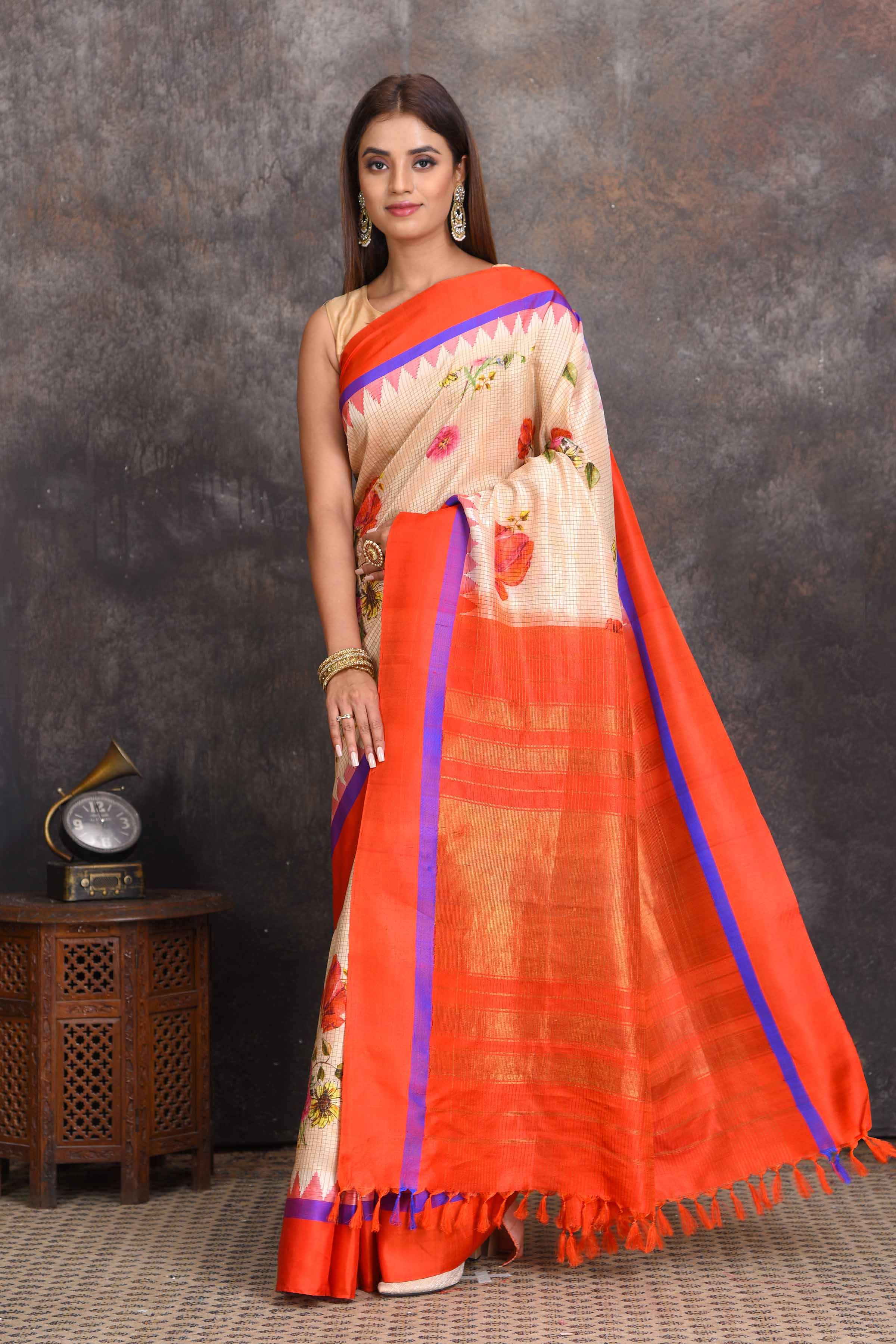 Buy stunning cream floral Gadhwal silk saree online in USA with red border. Get festive ready in beautiful Kanchipuram silk sarees, pure silk sarees, soft silk sarees, tussar silk saris, handwoven sarees, chanderi silk sarees from Pure Elegance Indian saree store in USA.-full view