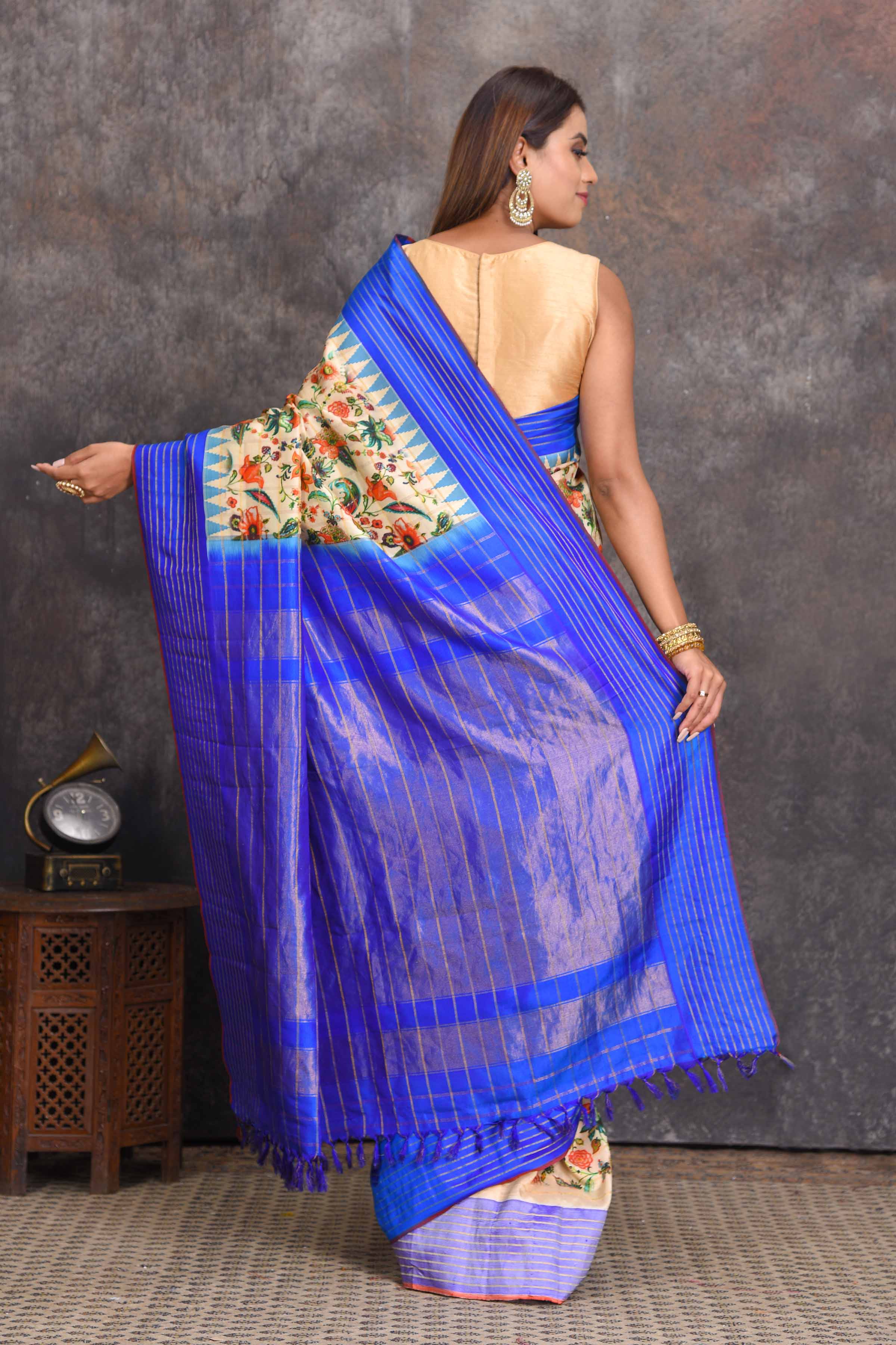 Shop cream printed Gadhwal silk saree online in USA with blue border. Get festive ready in beautiful Kanchipuram silk sarees, pure silk sarees, soft silk sarees, tussar silk saris, handwoven sarees, chanderi silk sarees from Pure Elegance Indian saree store in USA.-back
