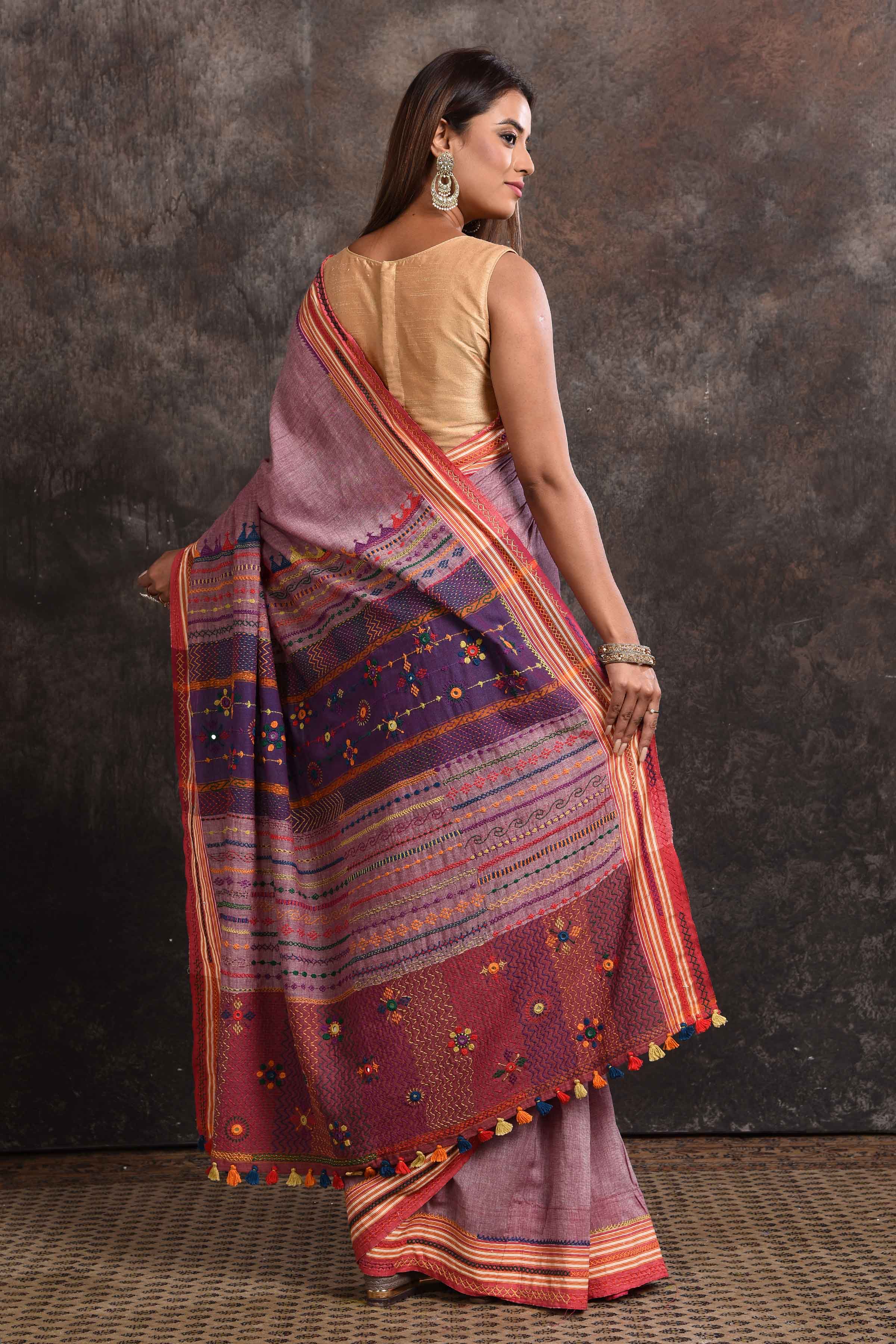 Buy stunning onion pink Lambani khaddi cotton saree online in USA. Look your ethnic best on festive occasions with latest designer sarees, pure silk sarees, Kanchipuram silk sarees, handwoven sarees, tussar silk sarees, embroidered sarees from Pure Elegance Indian saree store in USA.-back