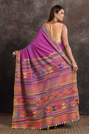 Buy stunning lavender Lambani khaddi cotton saree online in USA. Look your ethnic best on festive occasions with latest designer sarees, pure silk sarees, Kanchipuram silk sarees, handwoven sarees, tussar silk sarees, embroidered sarees from Pure Elegance Indian saree store in USA.-back