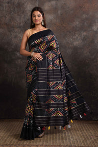 Shop beautiful black ikkat silk saree online in USA with zari stripes pallu. Look your ethnic best on festive occasions with latest designer sarees, pure silk sarees, Kanchipuram silk sarees, handwoven sarees, tussar silk sarees, embroidered sarees from Pure Elegance Indian saree store in USA.-full view
