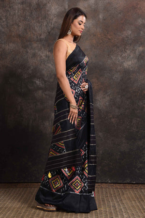 Shop beautiful black ikkat silk saree online in USA with zari stripes pallu. Look your ethnic best on festive occasions with latest designer sarees, pure silk sarees, Kanchipuram silk sarees, handwoven sarees, tussar silk sarees, embroidered sarees from Pure Elegance Indian saree store in USA.-side