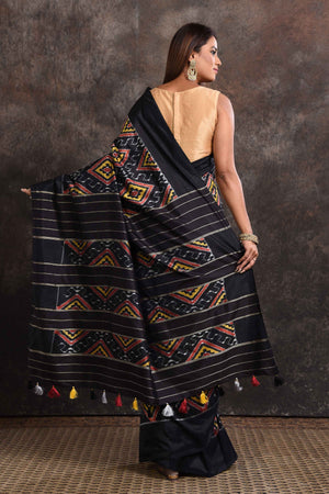 Shop beautiful black ikkat silk saree online in USA with zari stripes pallu. Look your ethnic best on festive occasions with latest designer sarees, pure silk sarees, Kanchipuram silk sarees, handwoven sarees, tussar silk sarees, embroidered sarees from Pure Elegance Indian saree store in USA.-back