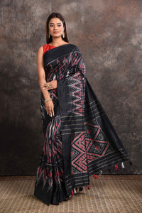 Buy beautiful black ikkat silk saree online in USA with zari stripes pallu. Look your ethnic best on festive occasions with latest designer sarees, pure silk sarees, Kanchipuram silk sarees, handwoven sarees, tussar silk sarees, embroidered sarees from Pure Elegance Indian saree store in USA.-full view
