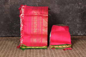 Buy beautiful cream Gadhwal silk saree online in USA with green pink zari border. Look your ethnic best on festive occasions with latest designer sarees, pure silk sarees, Kanchipuram silk sarees, handwoven sarees, tussar silk sarees, embroidered sarees from Pure Elegance Indian saree store in USA.-blouse