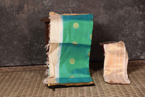 Buy stunning sea green Gadhwal silk sari online in USA with black and cream zari border. Look your ethnic best on festive occasions with latest designer sarees, pure silk sarees, Kanchipuram silk sarees, handwoven sarees, tussar silk sarees, embroidered sarees from Pure Elegance Indian saree store in USA.-blouse