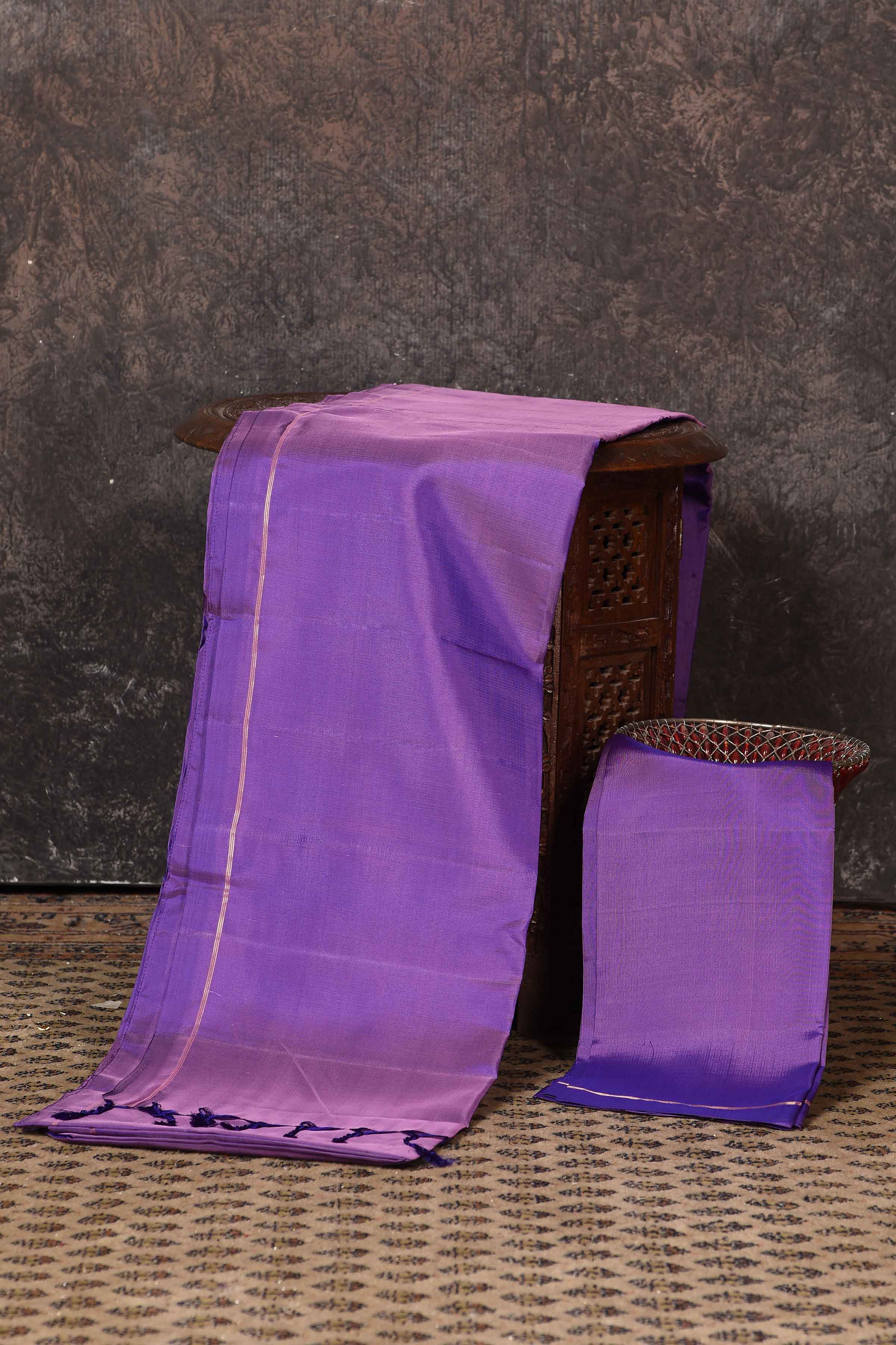 Buy stunning purple borderless Kanjeevaram silk sari online in USA. Keep your ethnic wardrobe up to date with latest designer sarees, pure silk sarees, Kanchipuram silk sarees, handwoven sarees, tussar silk sarees, embroidered sarees from Pure Elegance Indian saree store in USA.-blouse