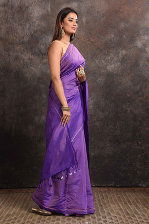 Buy stunning purple borderless Kanjeevaram silk sari online in USA. Keep your ethnic wardrobe up to date with latest designer sarees, pure silk sarees, Kanchipuram silk sarees, handwoven sarees, tussar silk sarees, embroidered sarees from Pure Elegance Indian saree store in USA.-side