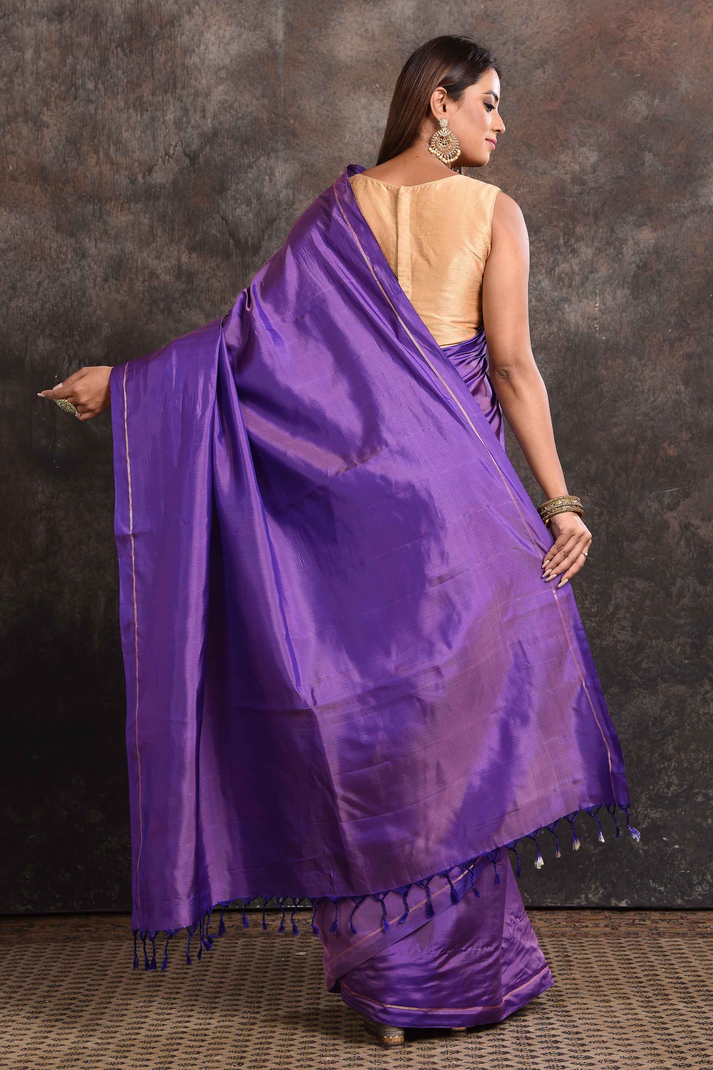 Buy stunning purple borderless Kanjeevaram silk sari online in USA. Keep your ethnic wardrobe up to date with latest designer sarees, pure silk sarees, Kanchipuram silk sarees, handwoven sarees, tussar silk sarees, embroidered sarees from Pure Elegance Indian saree store in USA.-back