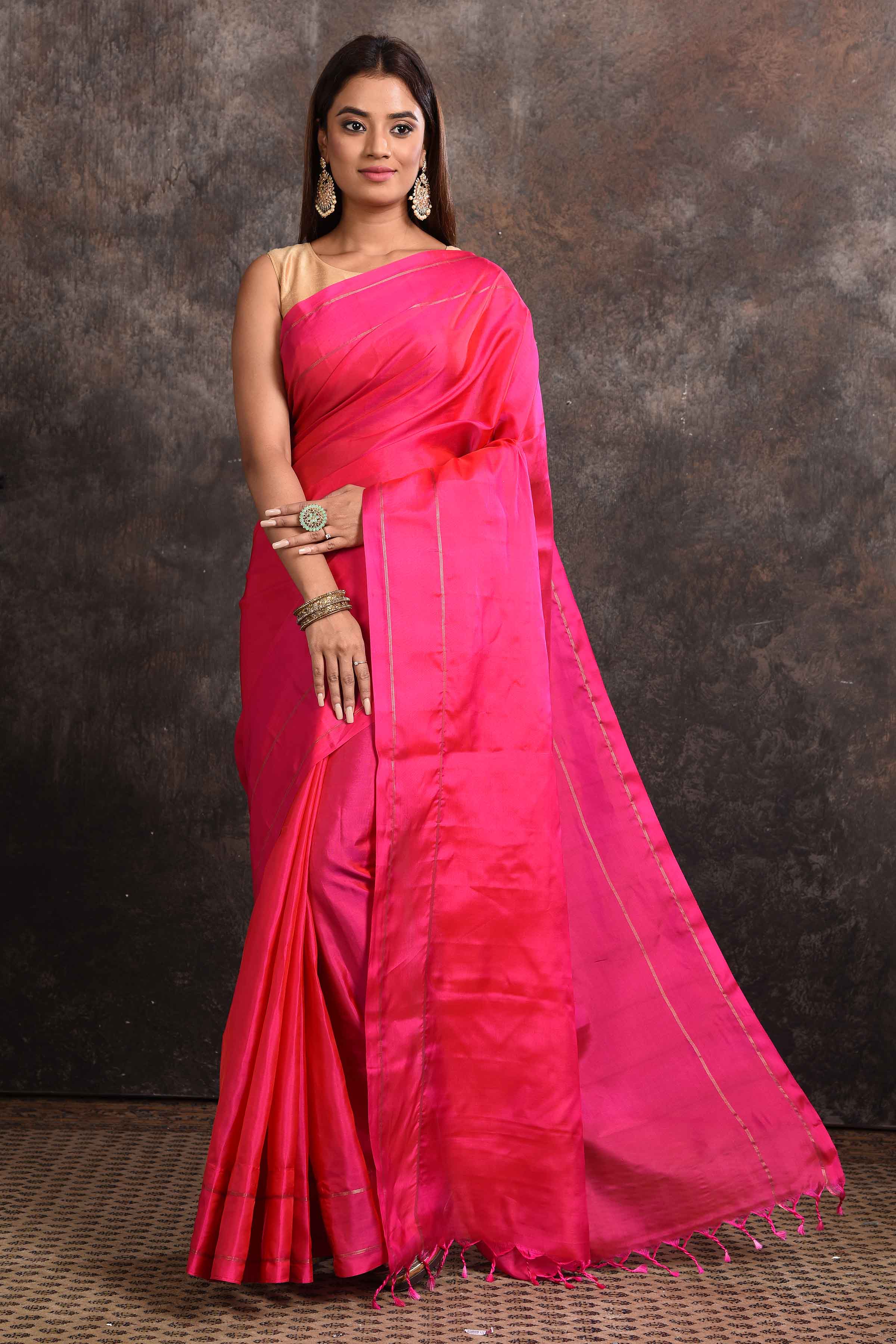 Shop bright pink borderless Kanjeevaram silk sari online in USA. Keep your ethnic wardrobe up to date with latest designer sarees, pure silk sarees, Kanchipuram silk sarees, handwoven sarees, tussar silk sarees, embroidered sarees from Pure Elegance Indian saree store in USA.-full view