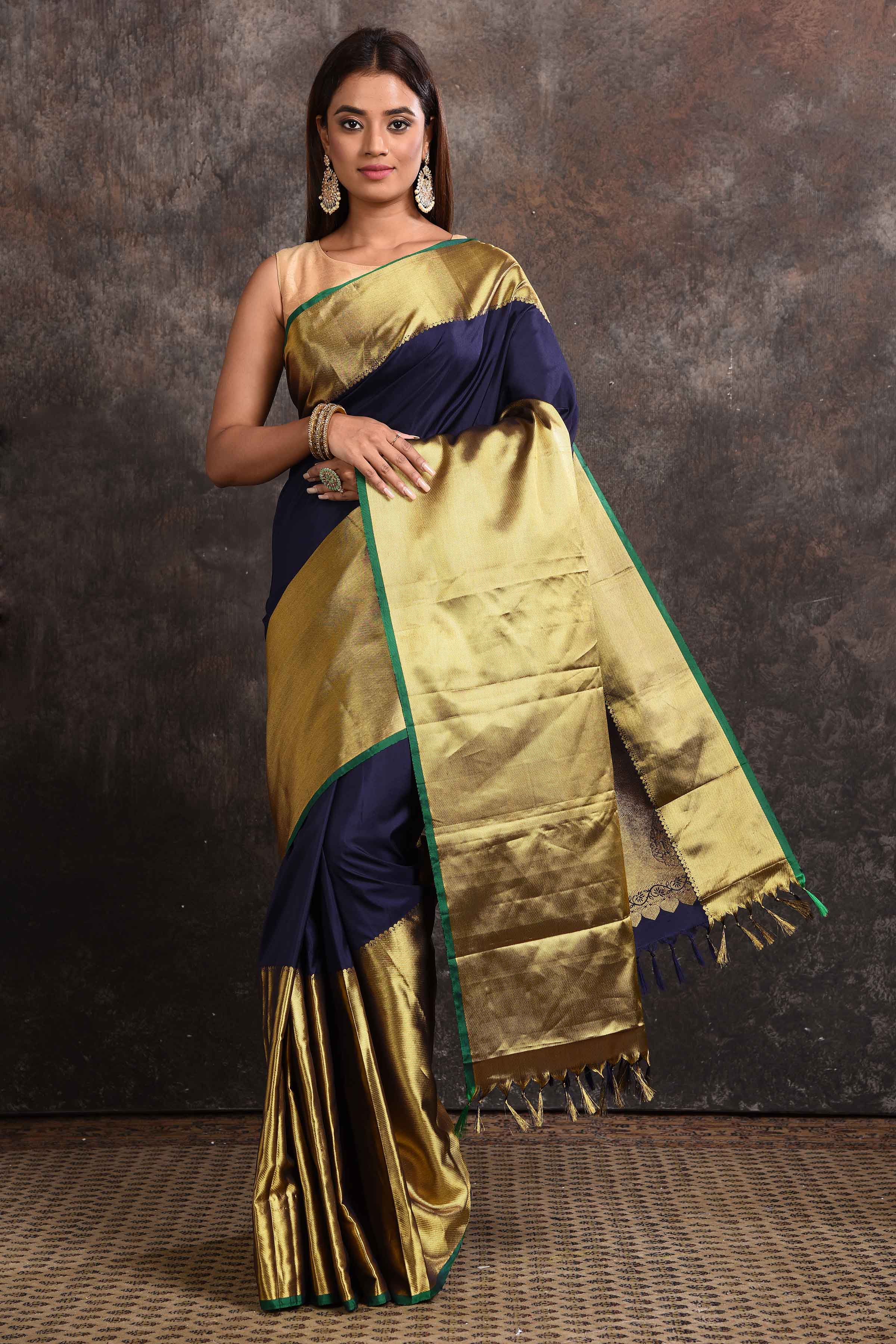 Buy beautiful navy and golden zari border Kanjeevaram silk sari online in USA. Keep your ethnic wardrobe up to date with latest designer sarees, pure silk sarees, Kanchipuram silk sarees, handwoven sarees, tussar silk sarees, embroidered sarees from Pure Elegance Indian saree store in USA.-full view