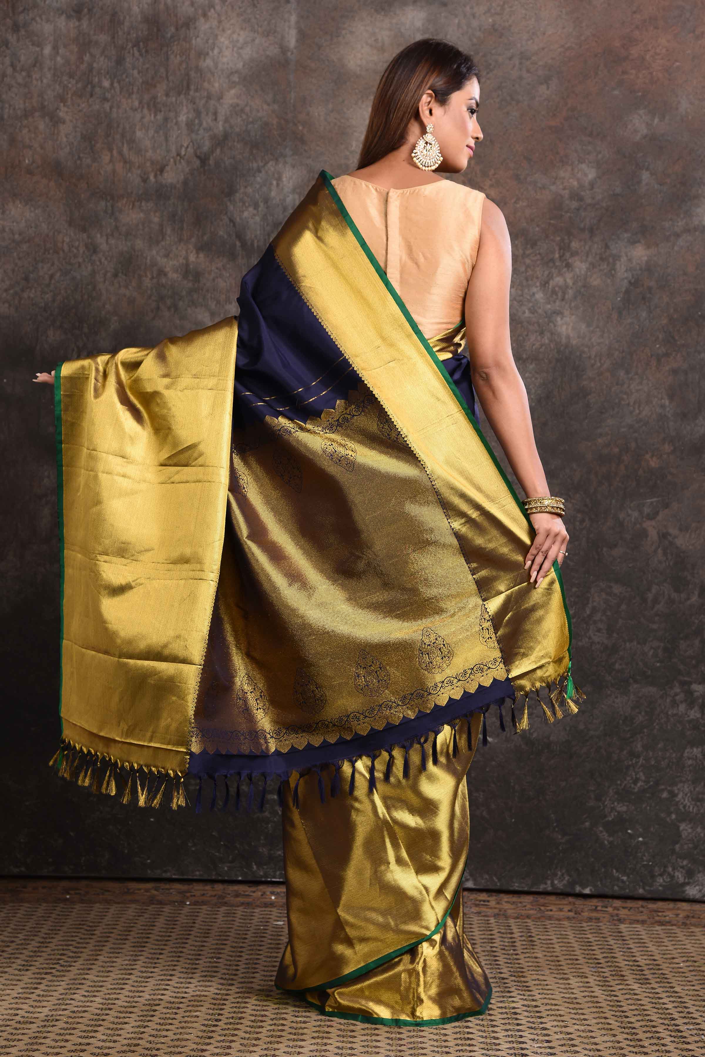 Buy beautiful navy and golden zari border Kanjeevaram silk sari online in USA. Keep your ethnic wardrobe up to date with latest designer sarees, pure silk sarees, Kanchipuram silk sarees, handwoven sarees, tussar silk sarees, embroidered sarees from Pure Elegance Indian saree store in USA.-back