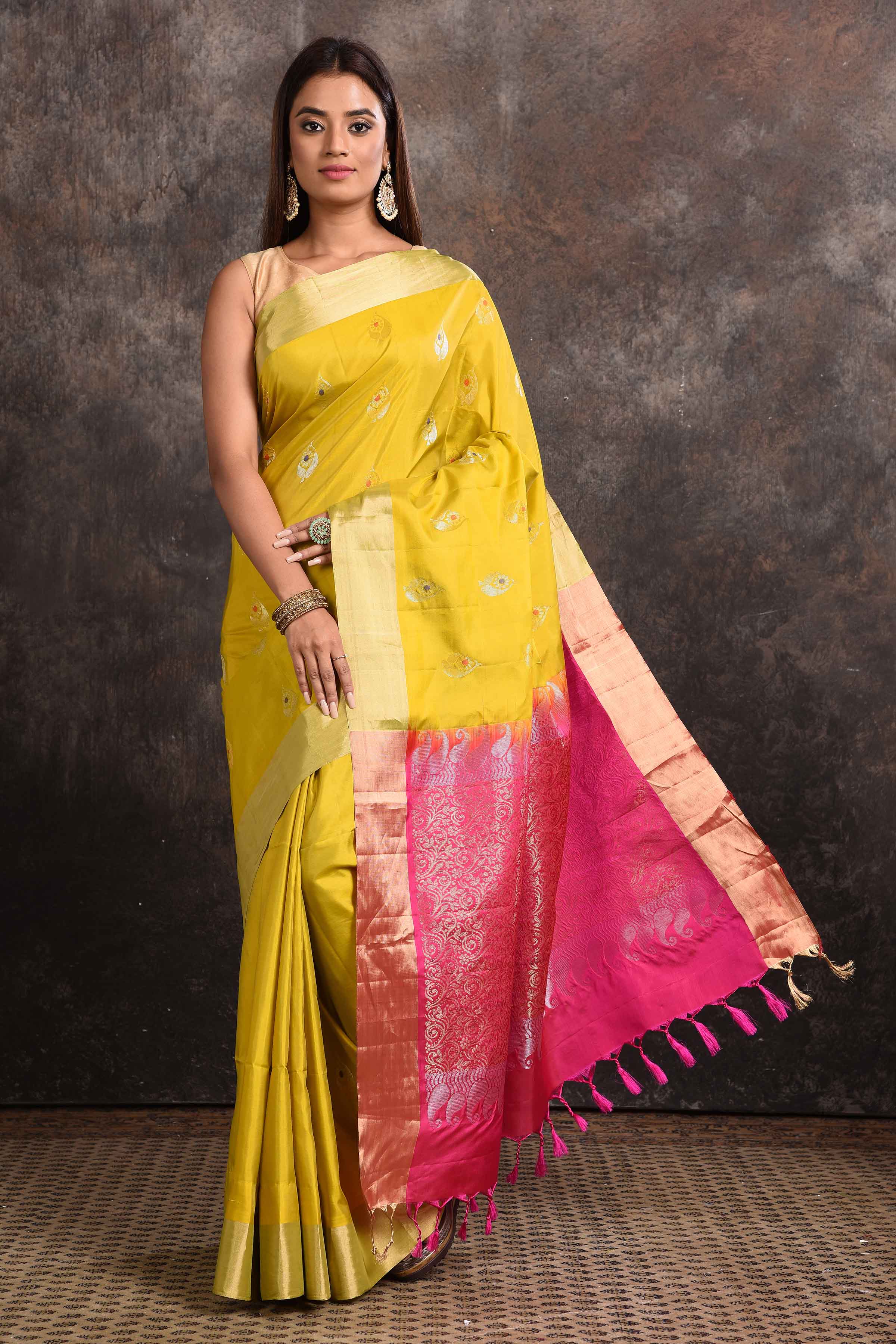 Shop beautiful yellow Kanjeevaram silk sari online in USA with pink zari pallu. Keep your ethnic wardrobe up to date with latest designer sarees, pure silk sarees, Kanchipuram silk sarees, handwoven sarees, tussar silk sarees, embroidered sarees from Pure Elegance Indian saree store in USA.-full view