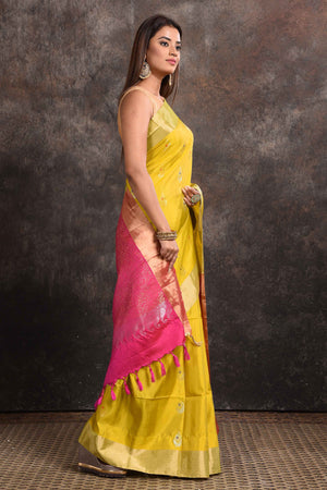Shop beautiful yellow Kanjeevaram silk sari online in USA with pink zari pallu. Keep your ethnic wardrobe up to date with latest designer sarees, pure silk sarees, Kanchipuram silk sarees, handwoven sarees, tussar silk sarees, embroidered sarees from Pure Elegance Indian saree store in USA.-side