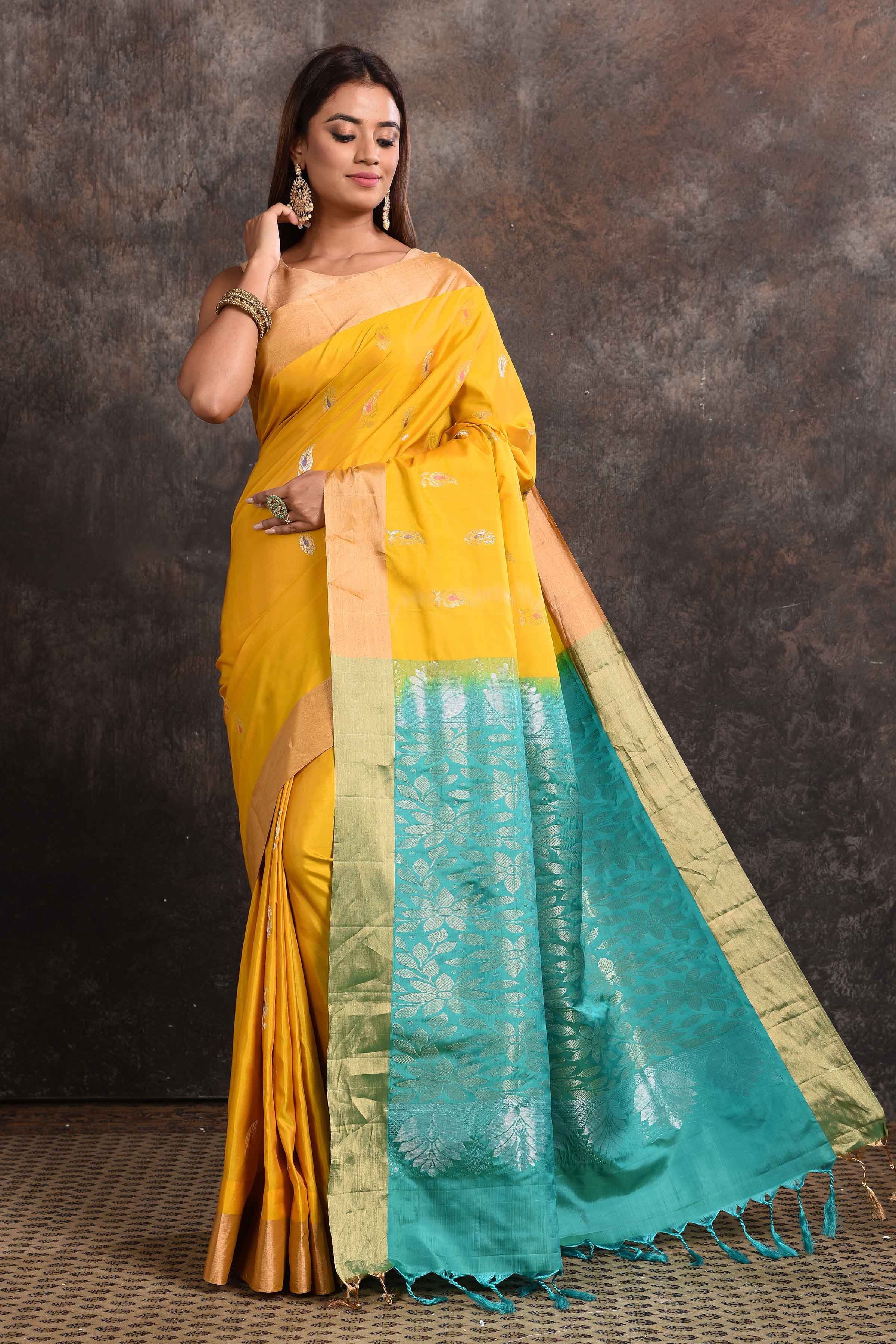 Buy stunning yellow Kanjeevaram silk sari online in USA with blue zari pallu. Keep your ethnic wardrobe up to date with latest designer sarees, pure silk sarees, Kanchipuram silk sarees, handwoven sarees, tussar silk sarees, embroidered sarees from Pure Elegance Indian saree store in USA.-full view