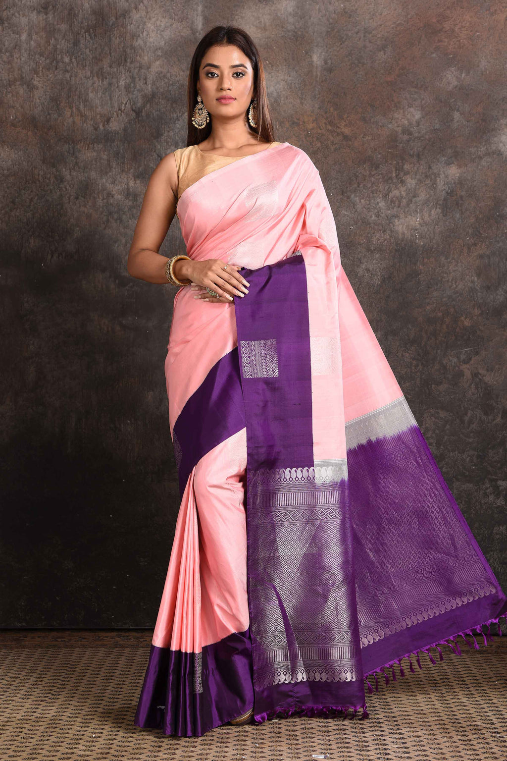 Shop beautiful pastel pink Kanjeevaram silk sari online in USA with purple zari border. Keep your ethnic wardrobe up to date with latest designer sarees, pure silk sarees, Kanchipuram silk sarees, handwoven sarees, tussar silk sarees, embroidered sarees from Pure Elegance Indian saree store in USA.-full view