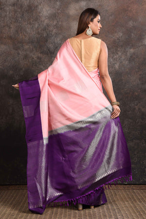 Shop beautiful pastel pink Kanjeevaram silk sari online in USA with purple zari border. Keep your ethnic wardrobe up to date with latest designer sarees, pure silk sarees, Kanchipuram silk sarees, handwoven sarees, tussar silk sarees, embroidered sarees from Pure Elegance Indian saree store in USA.-back