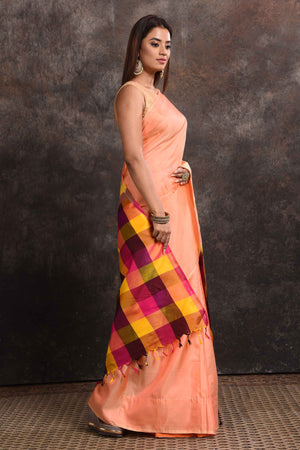 Shop beautiful peach Kanjeevaram silk sari online in USA with multicolor check border. Keep your ethnic wardrobe up to date with latest designer sarees, pure silk sarees, Kanchipuram silk sarees, handwoven sarees, tussar silk sarees, embroidered sarees from Pure Elegance Indian saree store in USA.-side