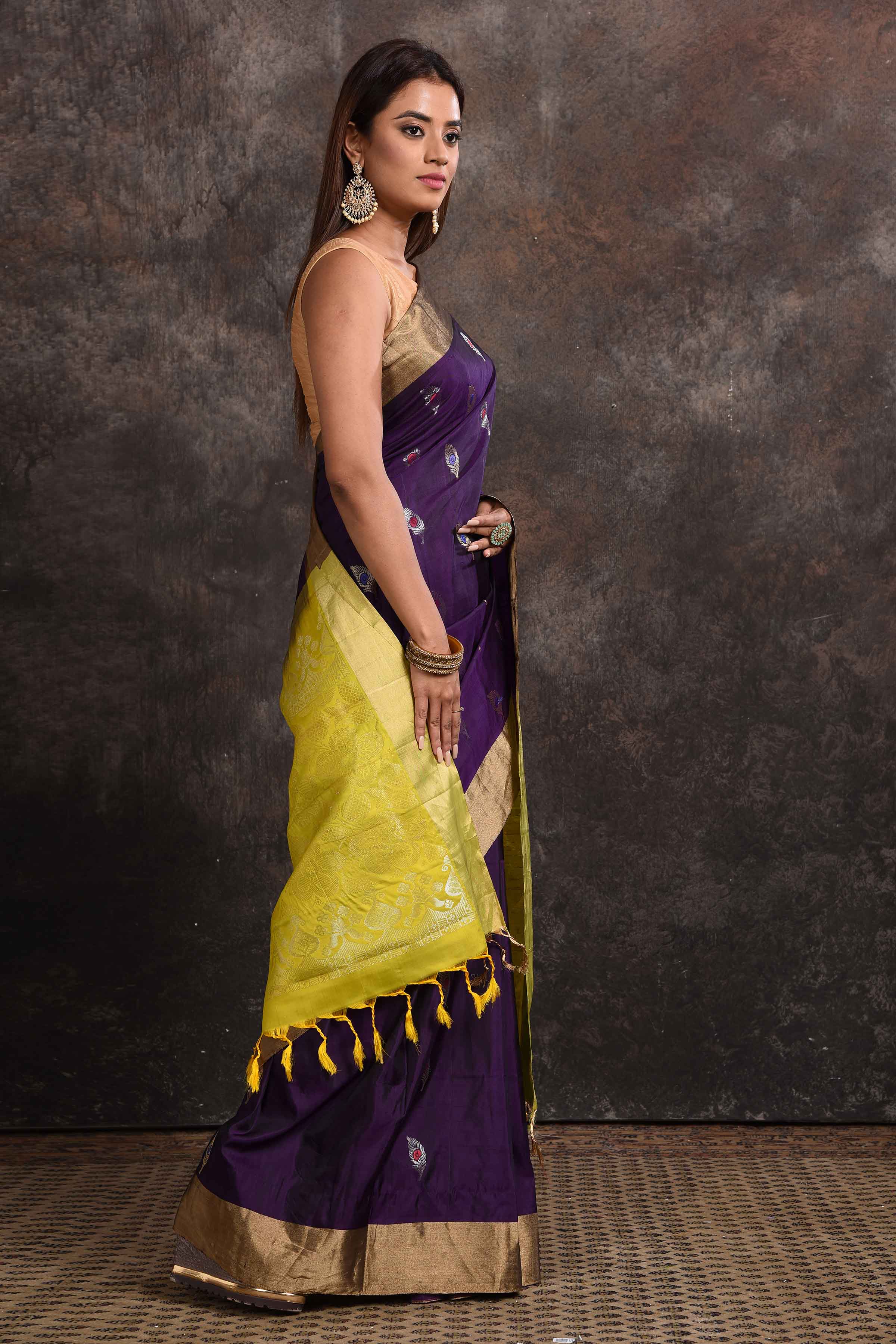 Shop beautiful purple Kanjeevaram silk saree online in USA with yellow zari pallu. Keep your ethnic wardrobe up to date with latest designer sarees, pure silk sarees, Kanchipuram silk sarees, handwoven sarees, tussar silk sarees, embroidered sarees from Pure Elegance Indian saree store in USA.-side