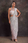 Buy silver sequin draped saree online in USA with designer blouse. Look your ethnic best on festive occasions with latest designer sarees, pure silk sarees, Kanchipuram silk sarees, designer dresses, Anarkali suits, gown, embroidered sarees from Pure Elegance Indian fashion store in USA.-full view