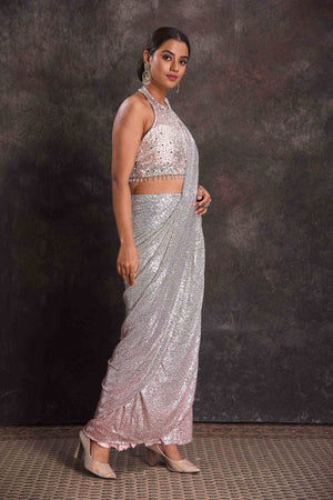 Buy silver sequin draped saree online in USA with designer blouse. Look your ethnic best on festive occasions with latest designer sarees, pure silk sarees, Kanchipuram silk sarees, designer dresses, Anarkali suits, gown, embroidered sarees from Pure Elegance Indian fashion store in USA.-saree