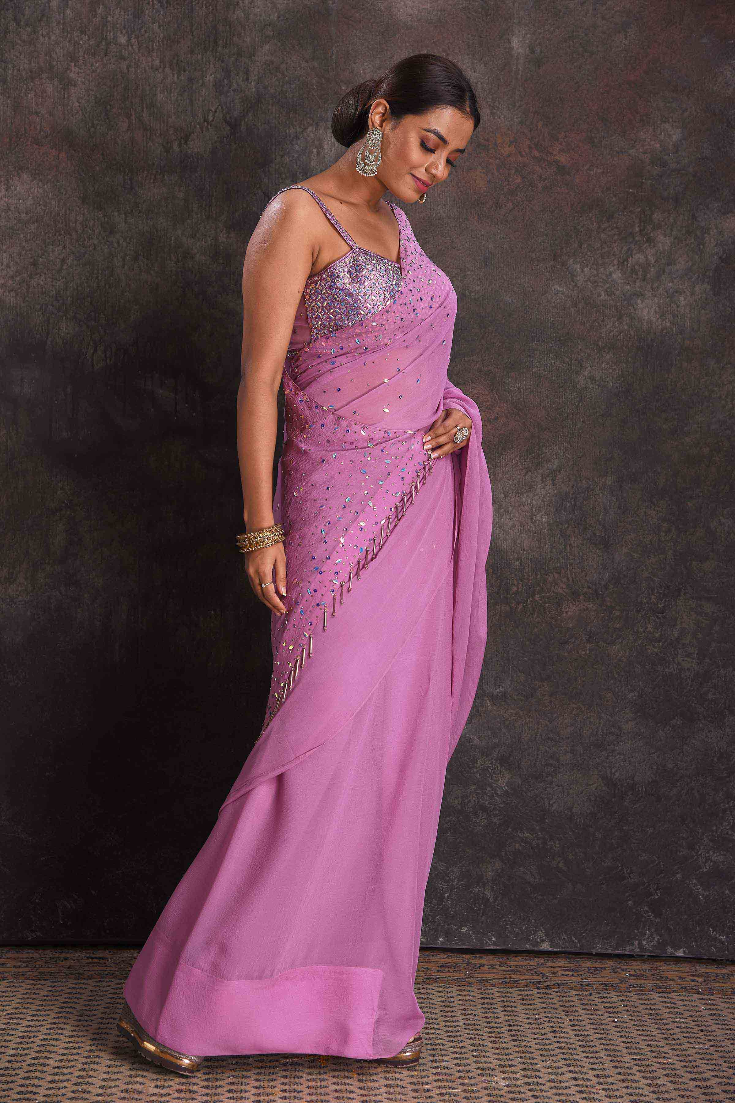 Shop beautiful lavender embroidered georgette saree online in USA with designer blouse. Look your ethnic best on festive occasions with latest designer sarees, pure silk sarees, Kanchipuram silk sarees, designer dresses, Anarkali suits, gown, embroidered sarees from Pure Elegance Indian fashion store in USA.-side