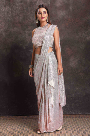 Buy beautiful silver sequin georgette pre-draped saree online in USA with designer blouse. Look your ethnic best on festive occasions with latest designer sarees, pure silk sarees, Kanchipuram silk sarees, designer dresses, Anarkali suits, gown, embroidered sarees from Pure Elegance Indian fashion store in USA.-side