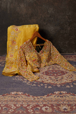 Buy beautiful mango yellow hand embroidered organza saree online in USA with blouse. Flaunt your Indian style on special occasions in beautiful designer sarees, embroidered sarees, Bollywood sarees, partywear sarees, wedding sarees from Pure Elegance Indian saree store in USA. -blouse