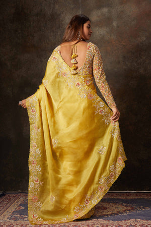 Buy beautiful mango yellow hand embroidered organza saree online in USA with blouse. Flaunt your Indian style on special occasions in beautiful designer sarees, embroidered sarees, Bollywood sarees, partywear sarees, wedding sarees from Pure Elegance Indian saree store in USA. -back