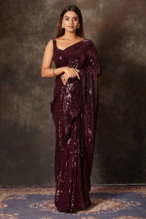 Buy beautiful wine color georgette saree online in USA with blouse. Flaunt your Indian style on special occasions in beautiful designer sarees, embroidered sarees, Bollywood sarees, partywear sarees, wedding sarees from Pure Elegance Indian saree store in USA. -front