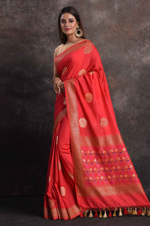 Shop beautiful red Muga silk saree online in USA with golden zari flower buta, Be a vision of ethnic elegance on festive occasions in beautiful designer sarees, silk sarees, handloom sarees, Kanchipuram silk sarees, embroidered sarees from Pure Elegance Indian saree store in USA. -pallu